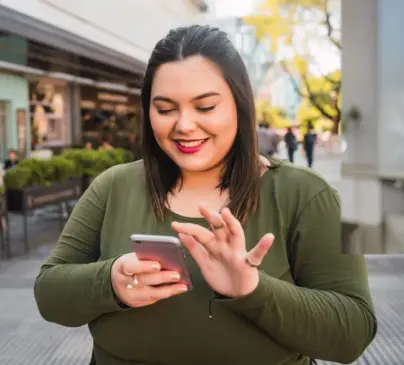 confident plus size woman on her phone